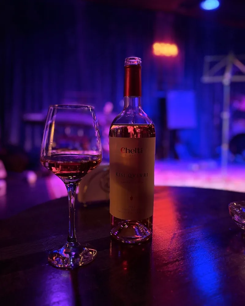 Bottle of Chelti Kisi qvevri wine and glass at 1984 Jazz Club