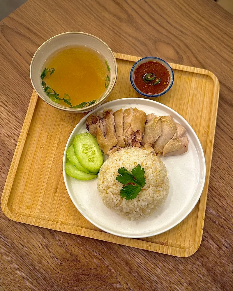 Hainanese chicken rice set with broth and chili sauce at Asiatique House & Bubble Tea