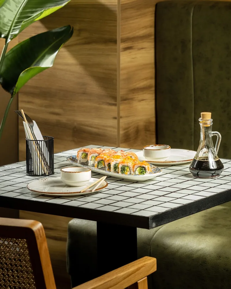Sushi rolls on an oval plate at Bangkok Digomi