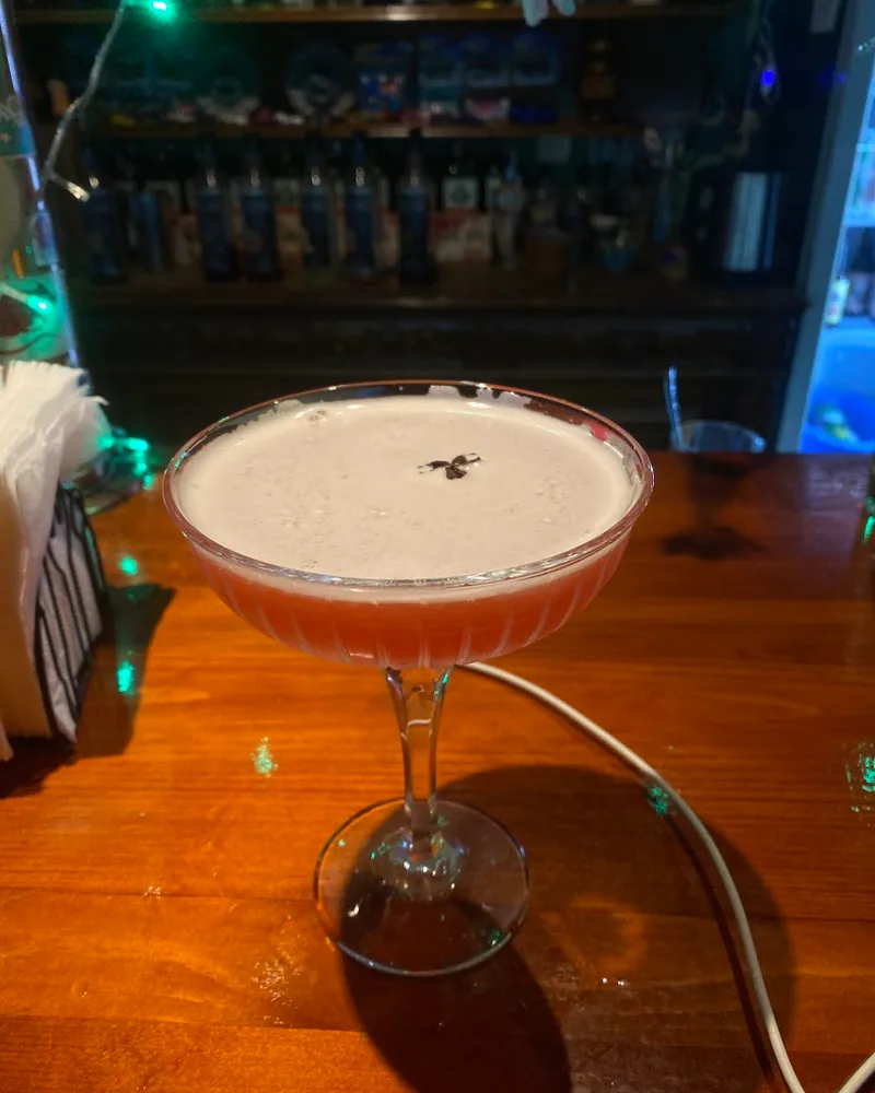 Pink cocktail in a coupe glass at Bar 36