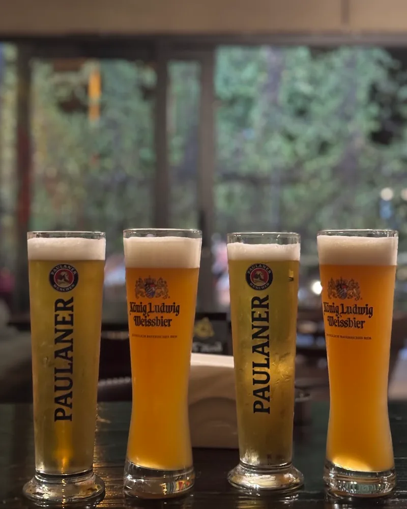 Glasses of Paulaner and König Ludwig beer at Beer Time