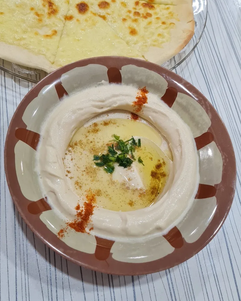 Hummus plate with olive oil and spices at Beirut