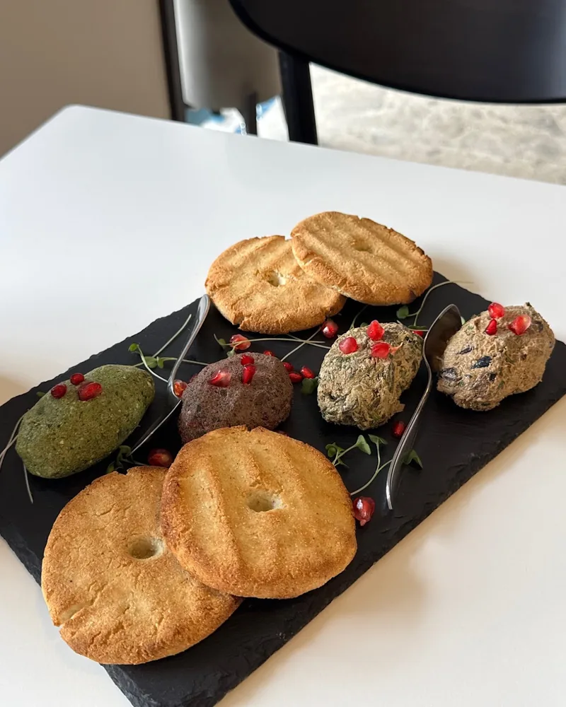 Georgian pkhali platter with mchadi corn bread at Bistro Conili