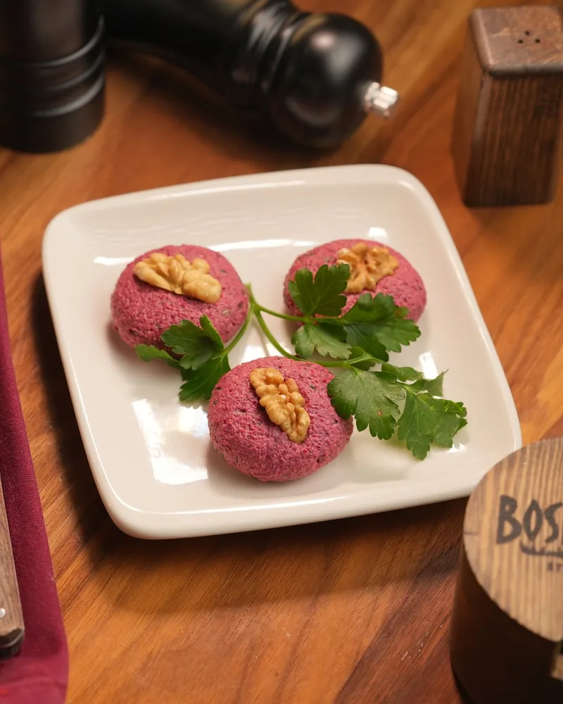 Beetroot pkhali topped with walnuts at Bosphorus Steakhouse & Terrace