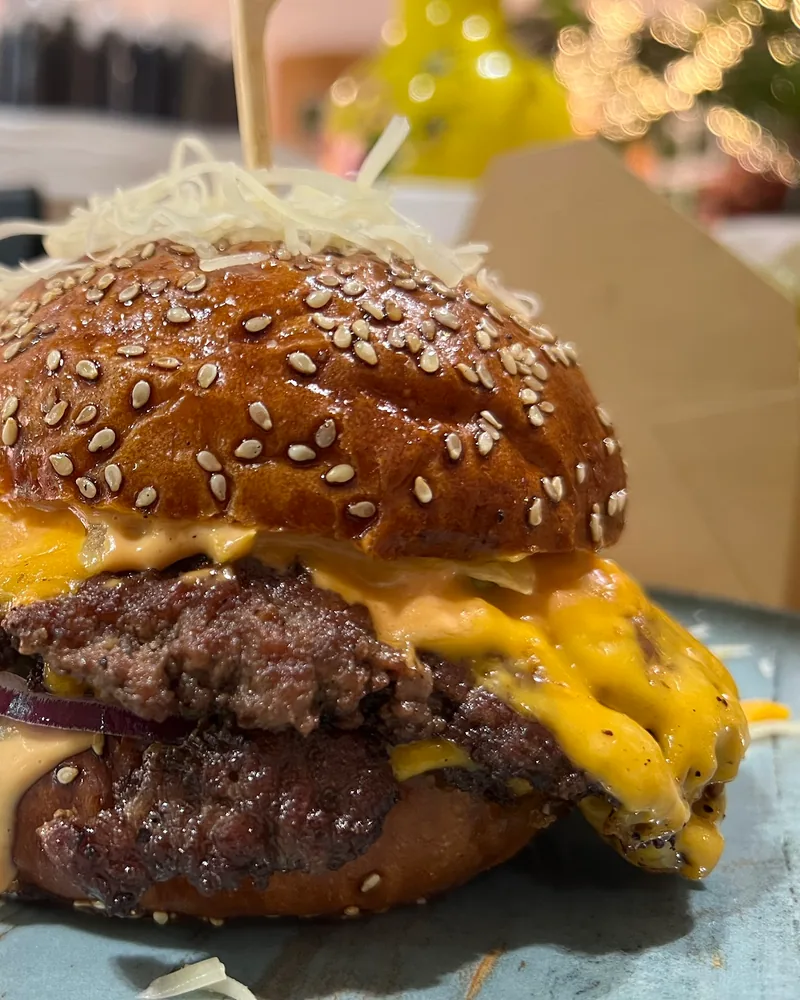 Cheeseburger with a double patty at Burger Lions