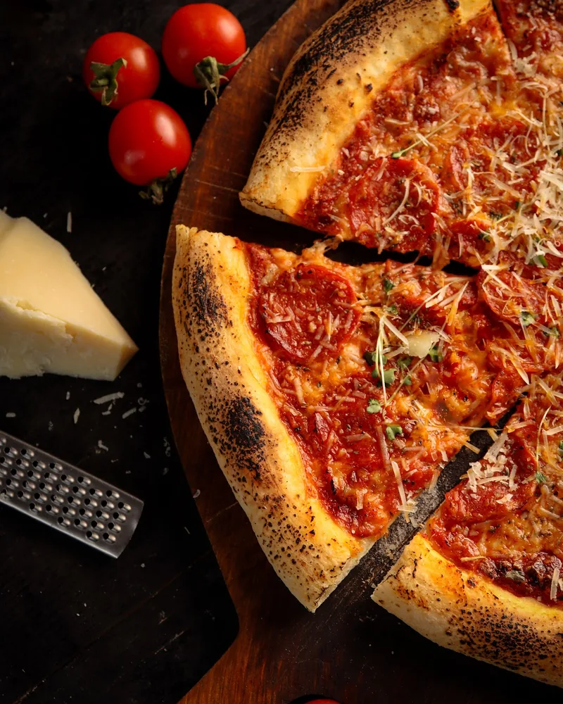 Pepperoni pizza with parmesan and cherry tomatoes at Cafe Dante