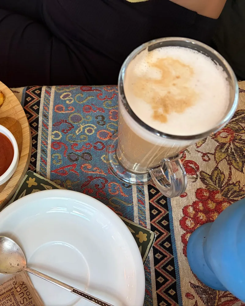 Toasted wrap with french fries, dip, and latte at Cafe Novel