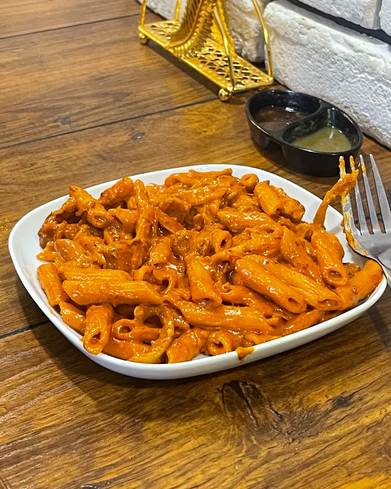 Penne pasta in red sauce at Chai GPT