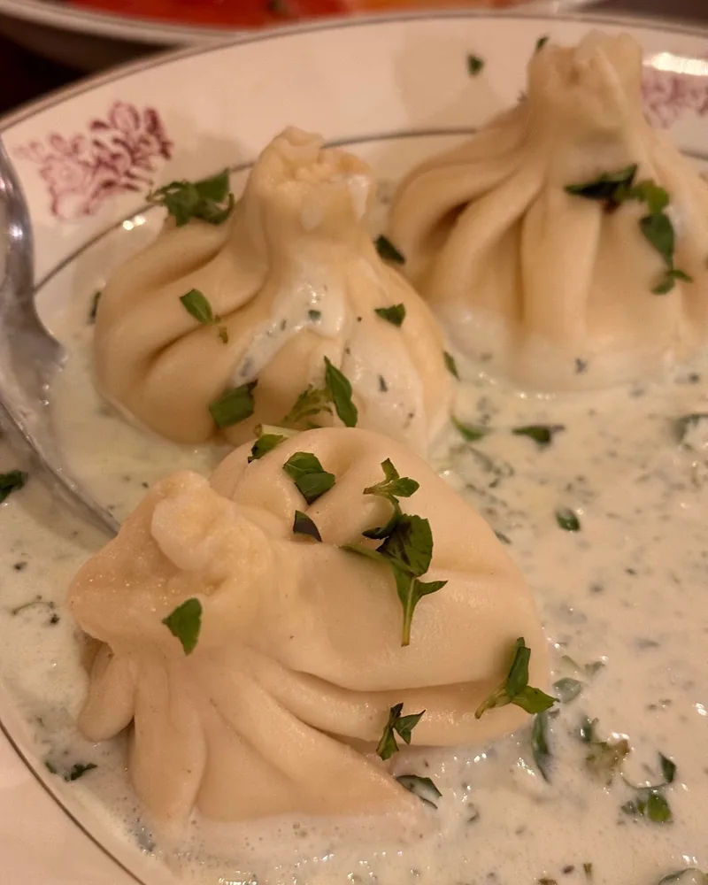 Khinkali in creamy herb sauce at Chokhi Veraze