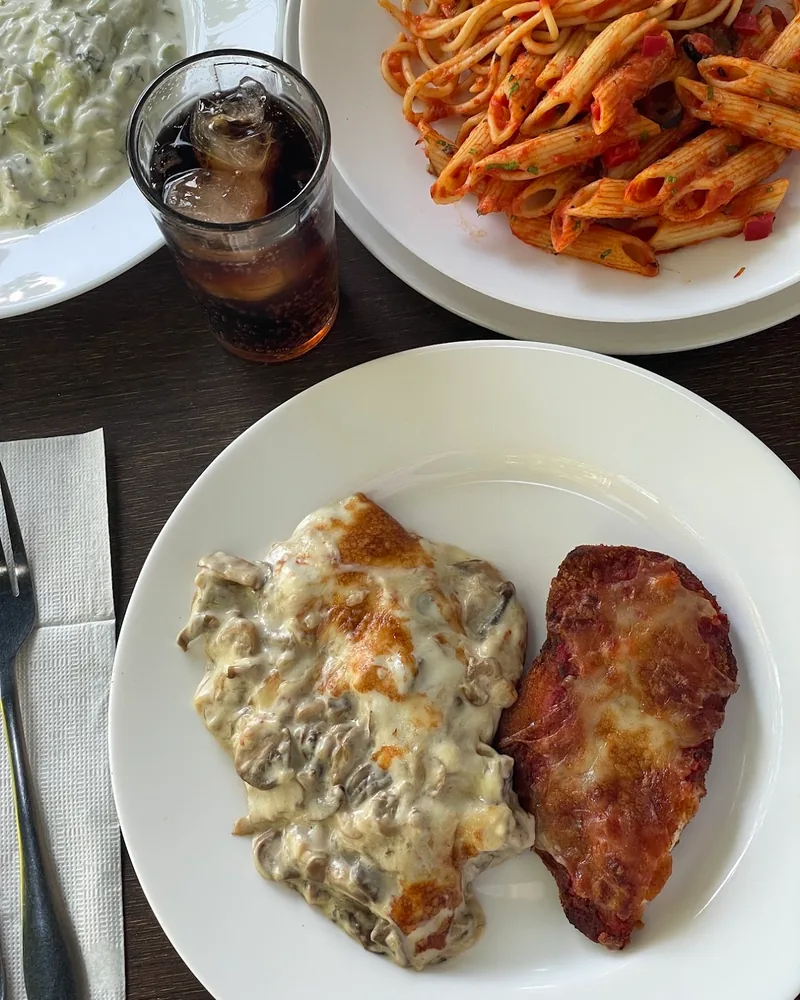 Baked chicken with cheese and pasta dishes at Degusto