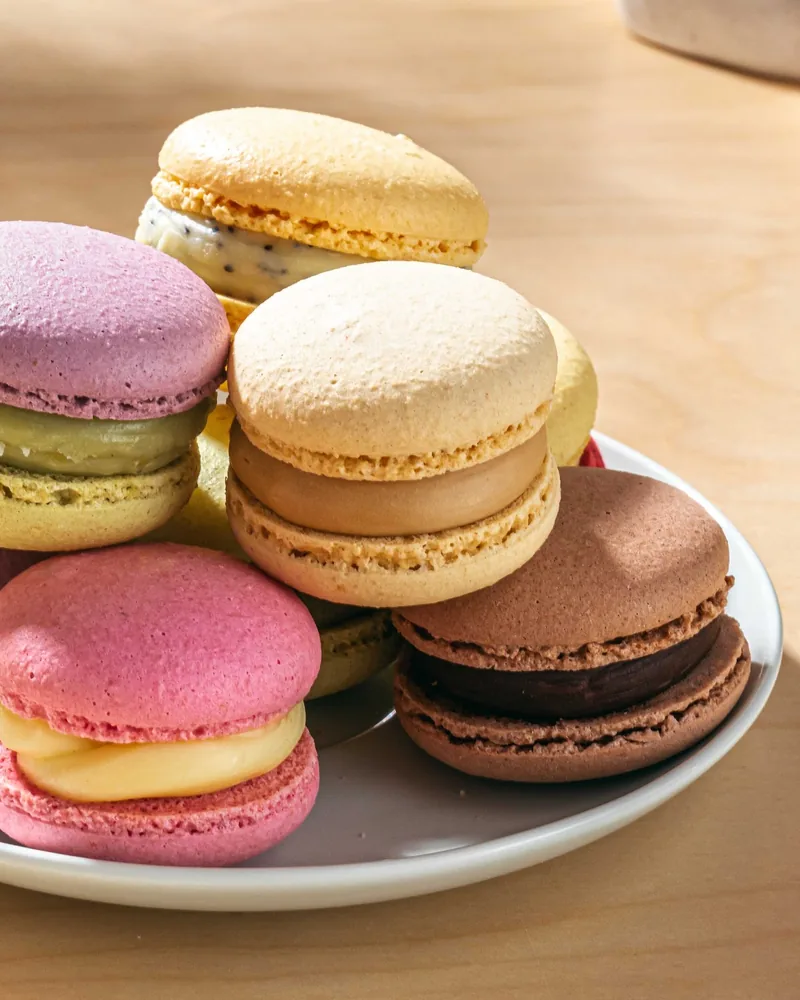 Assorted macarons on a plate at Dessert Ballet