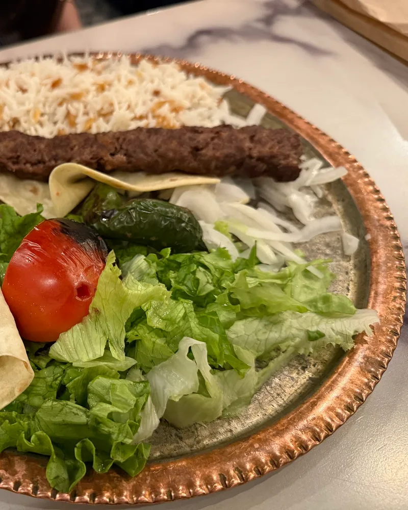Kebab platter with rice, flatbread and salad at Elit Restaurant