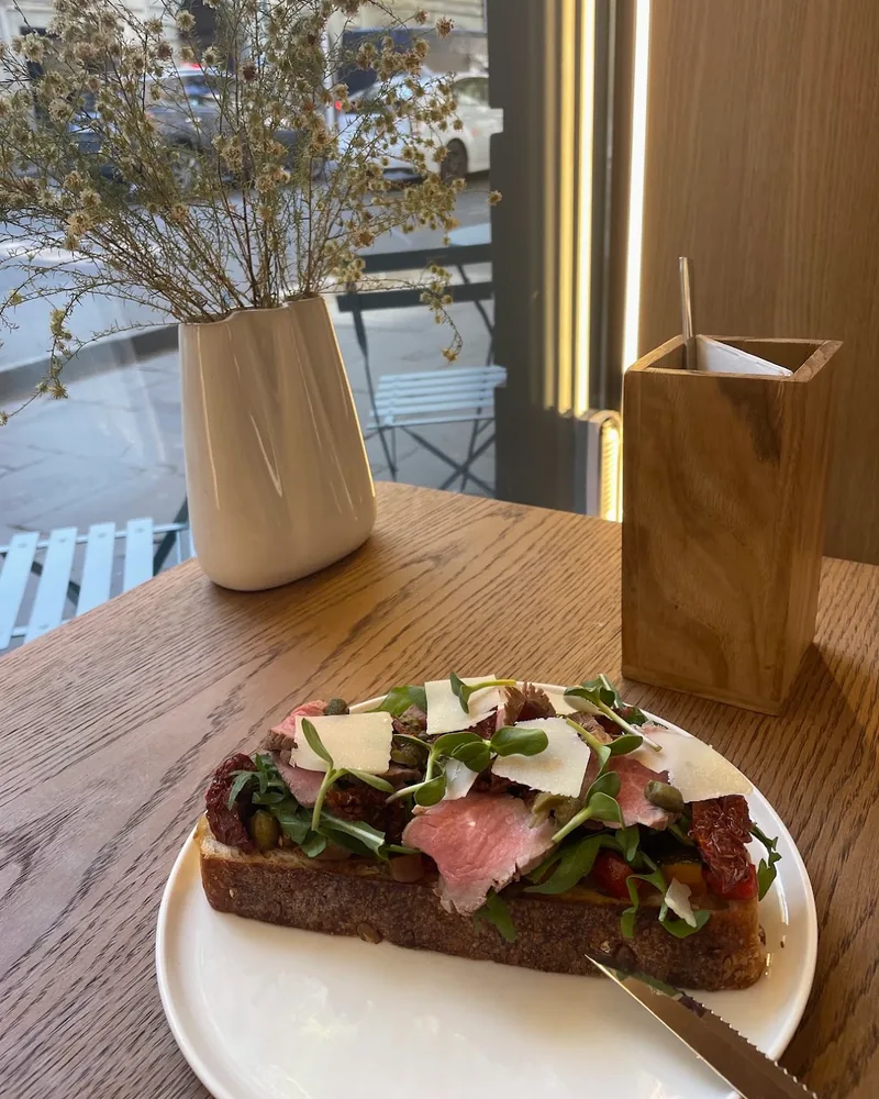 Open-faced roast beef sandwich with parmesan shavings at Chakandrila Cooking Classes