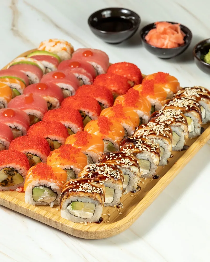 Sushi roll set on a wooden platter at iSushi