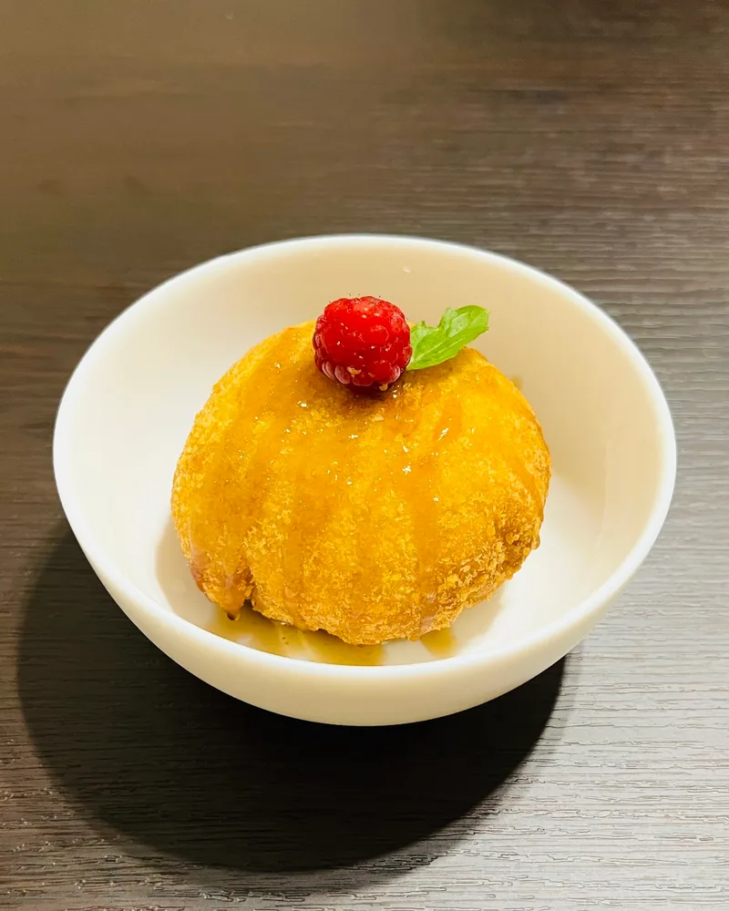 Fried ice cream topped with raspberry and mint at Kasorn Thai Cuisine