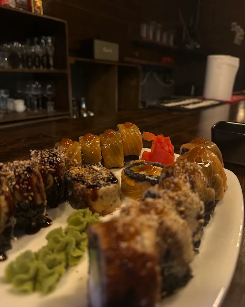 Sushi roll platter with wasabi and pickled ginger at Lion's Sushi Bar