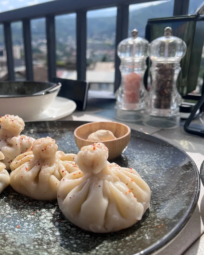 Khinkali dumplings with dipping sauce at Livin & Jagannath