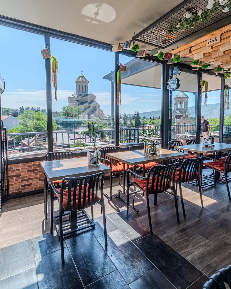 Indoor dining terrace overlooking the Holy Trinity Cathedral at Livin & Jagannath