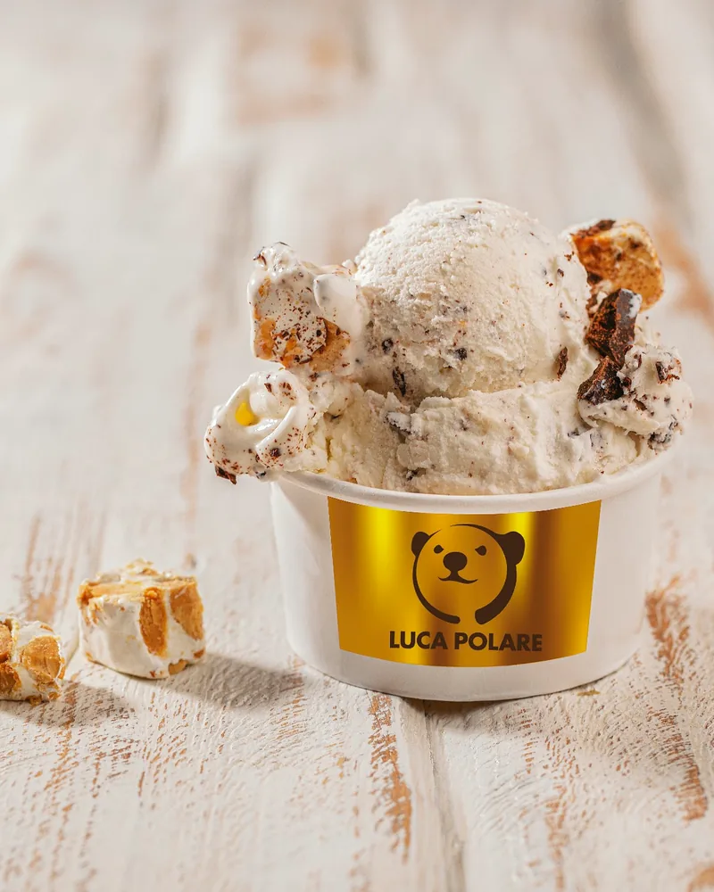 Ice cream cup with nougat pieces at Luca Polare