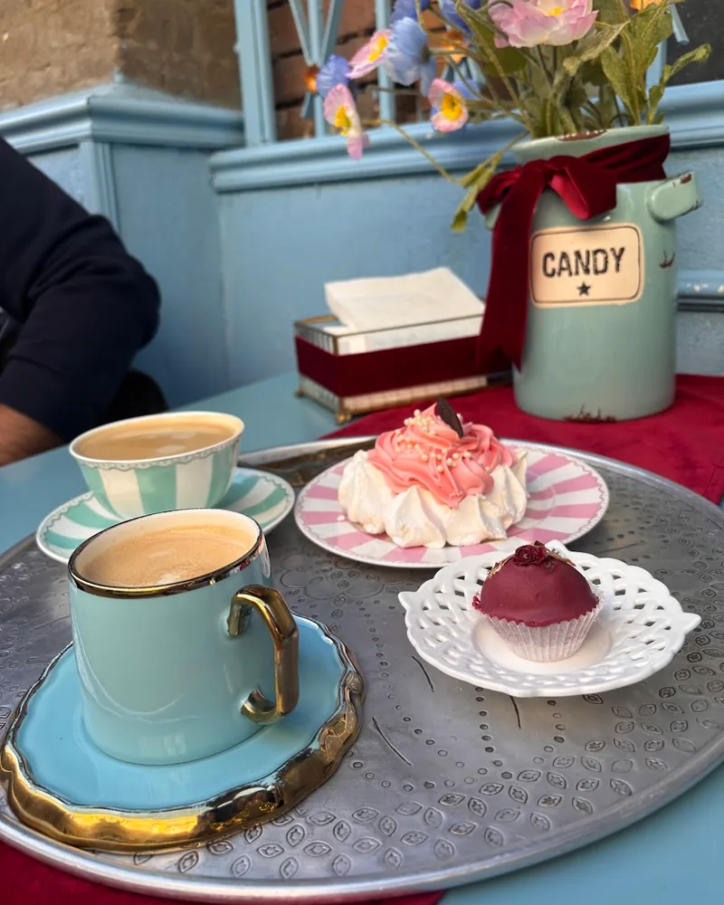 Coffee and pastries on a metal tray at Matasse1822