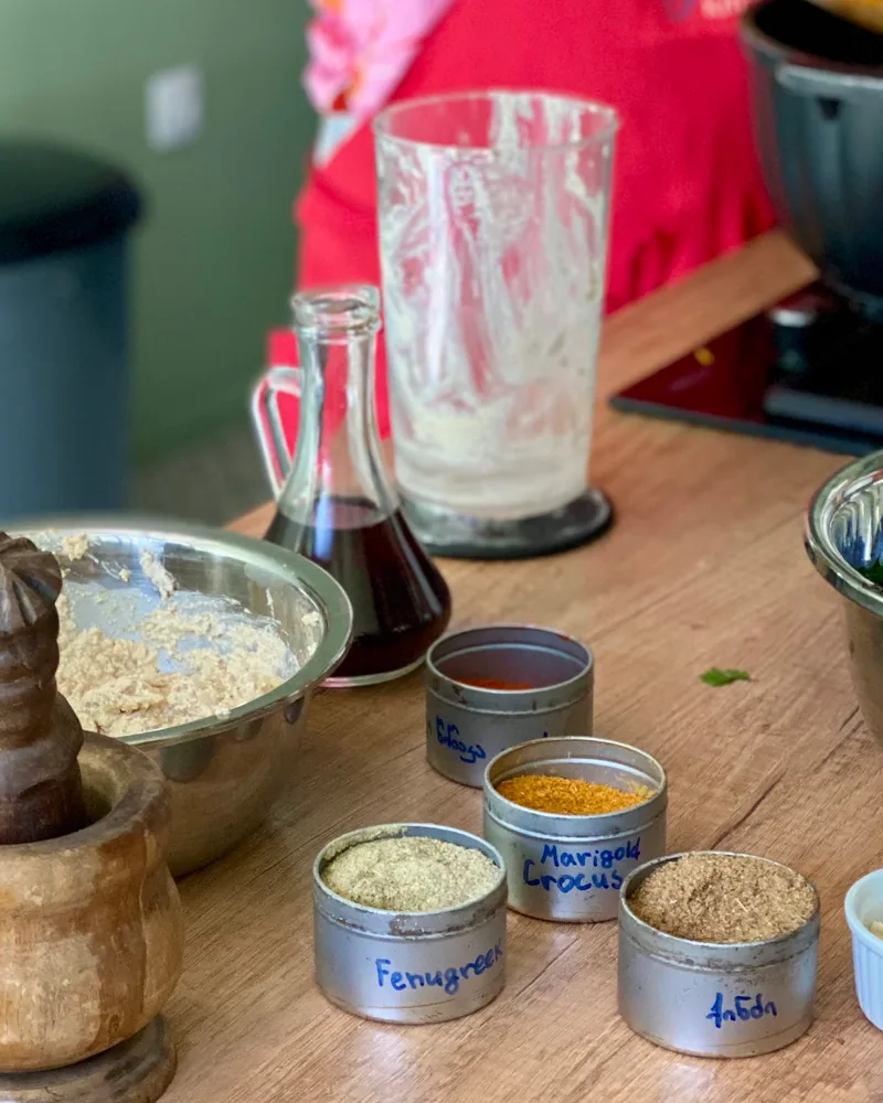 Cooking class ingredients and spices with mortar and pestle at Nana's Kitchen Cooking Classes