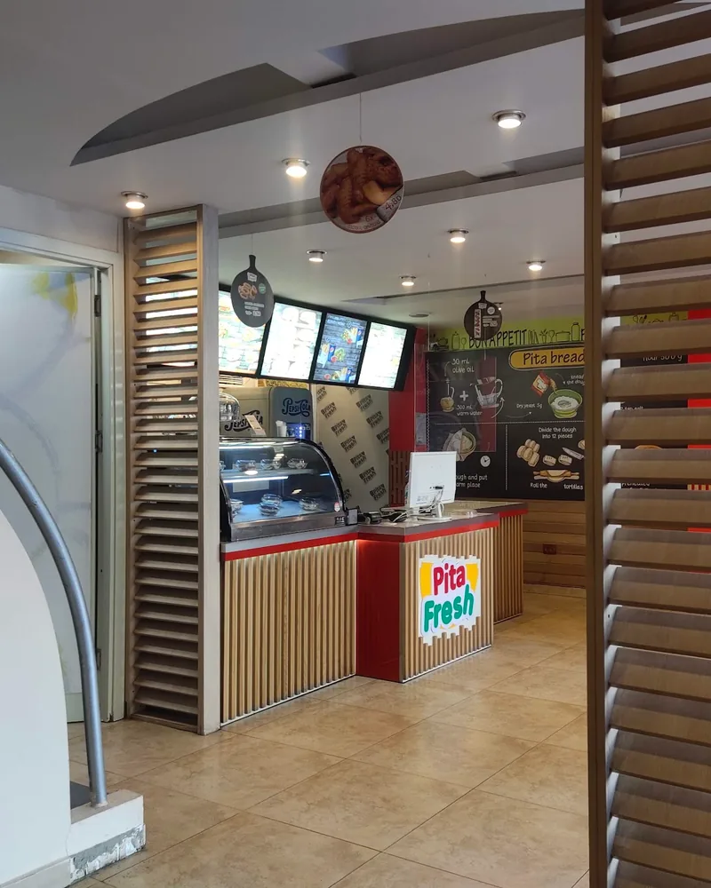 Service counter and ordering area at Pita Fresh