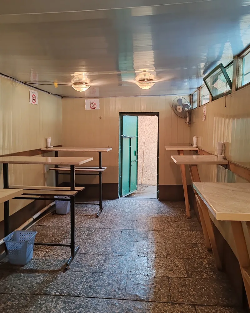 Indoor standing dining room with tall tables at Sausage house "Old Time"