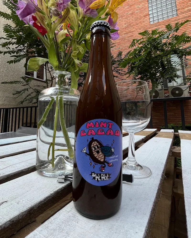 Beer bottle with mint cacao label at Secret Place