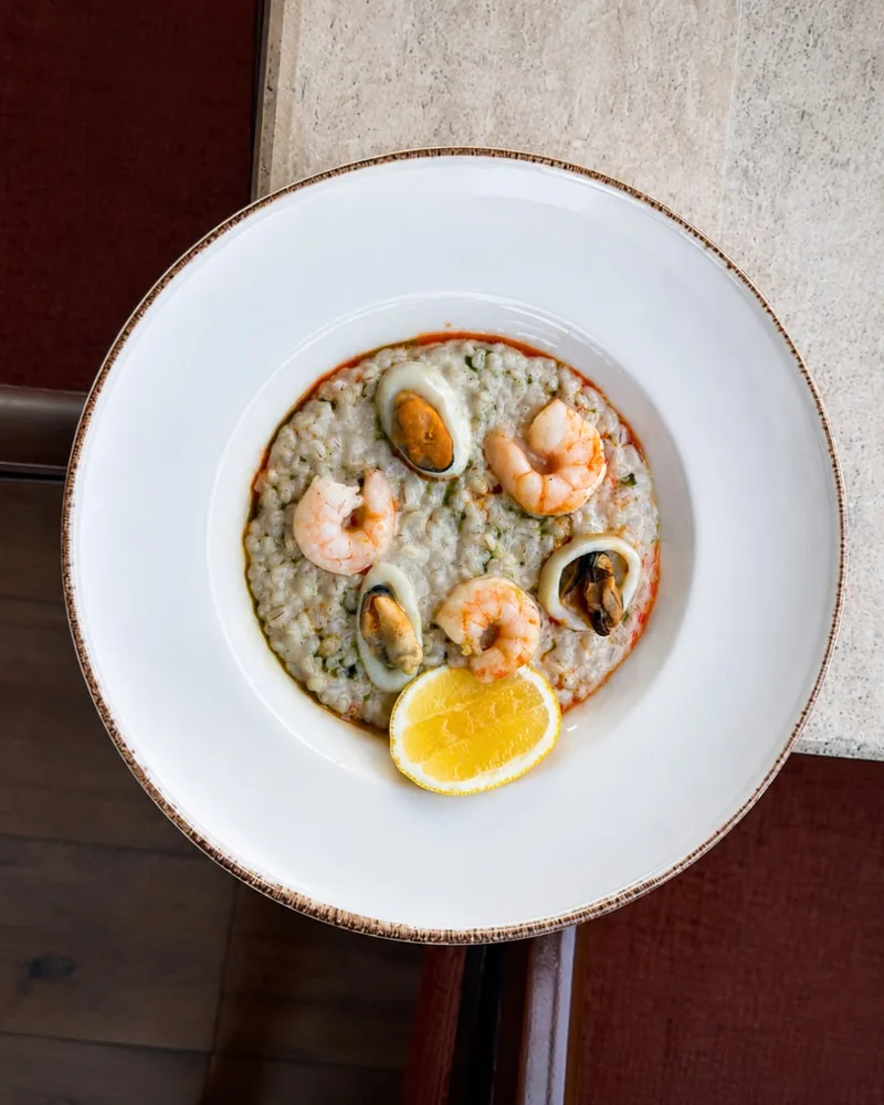 Seafood risotto with shrimp and mussels at See360