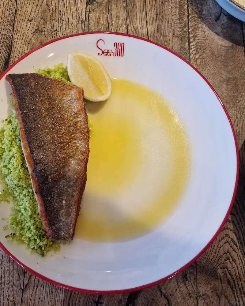 Pan-seared fish fillet with couscous and lemon at See360