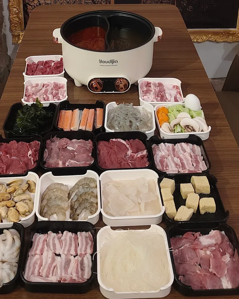 Hot pot set with meats and seafood ingredients at Siam Thai Cuisine