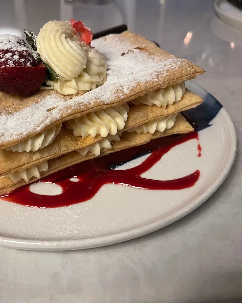 Mille-feuille with cream, strawberry, and berry sauce at Sormoni