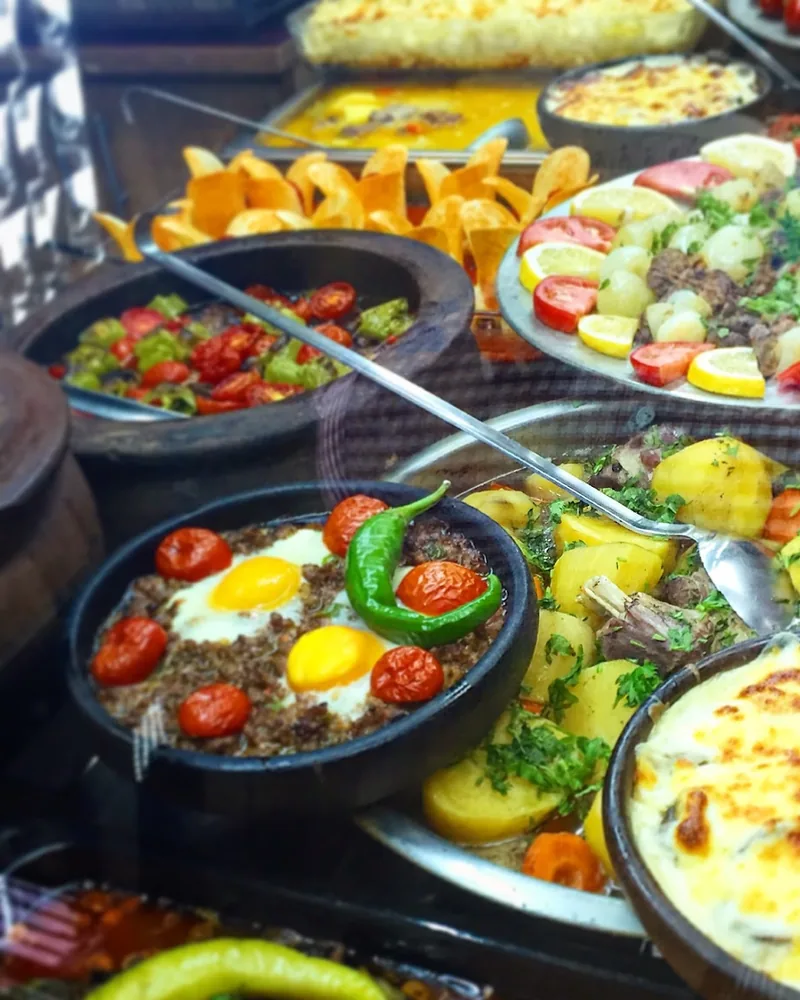 Turkish buffet spread of stews, meats and baked dishes at Sultan Sofrasi