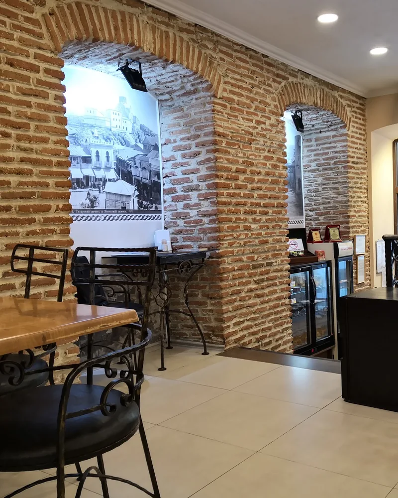 Dining area with exposed brick archways at Sultan Sofrasi