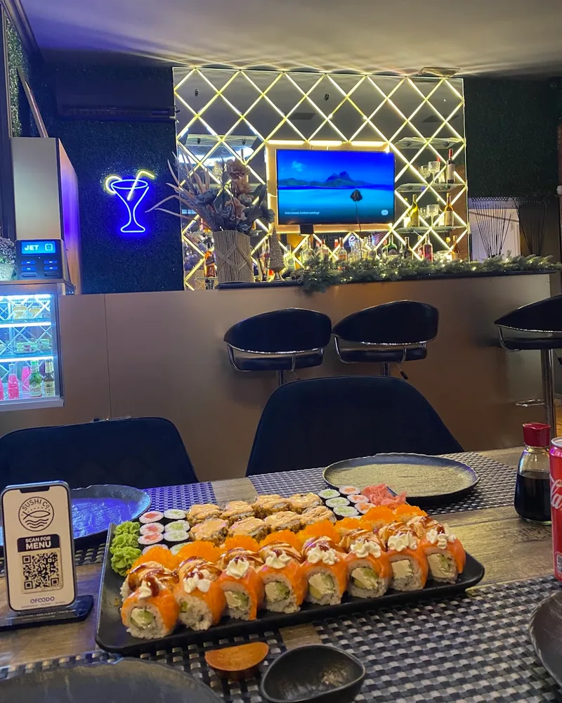 Sushi roll platter with salmon and crispy rolls at SushiCo