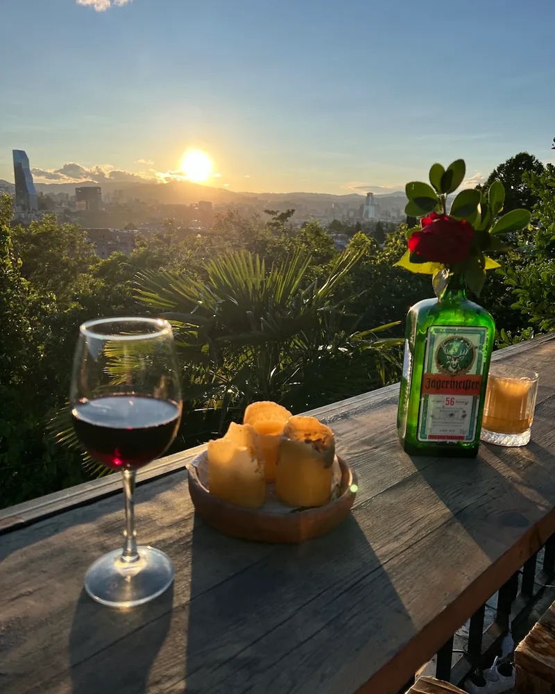 Glass of red wine on a terrace at sunset at Terrace Bar