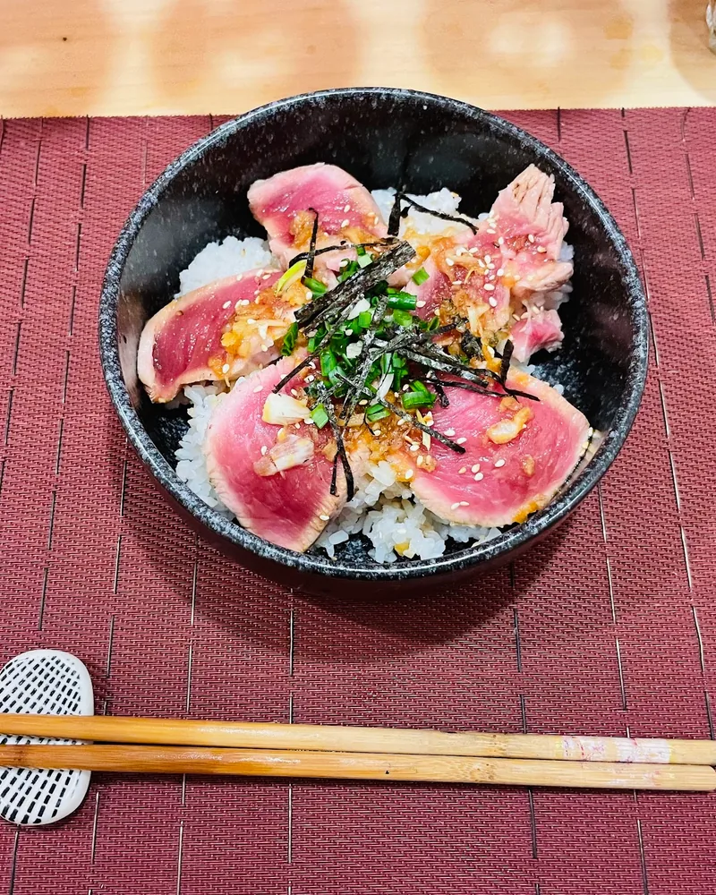 Tataki beef donburi in a ceramic bowl at The Yakitori Samurai