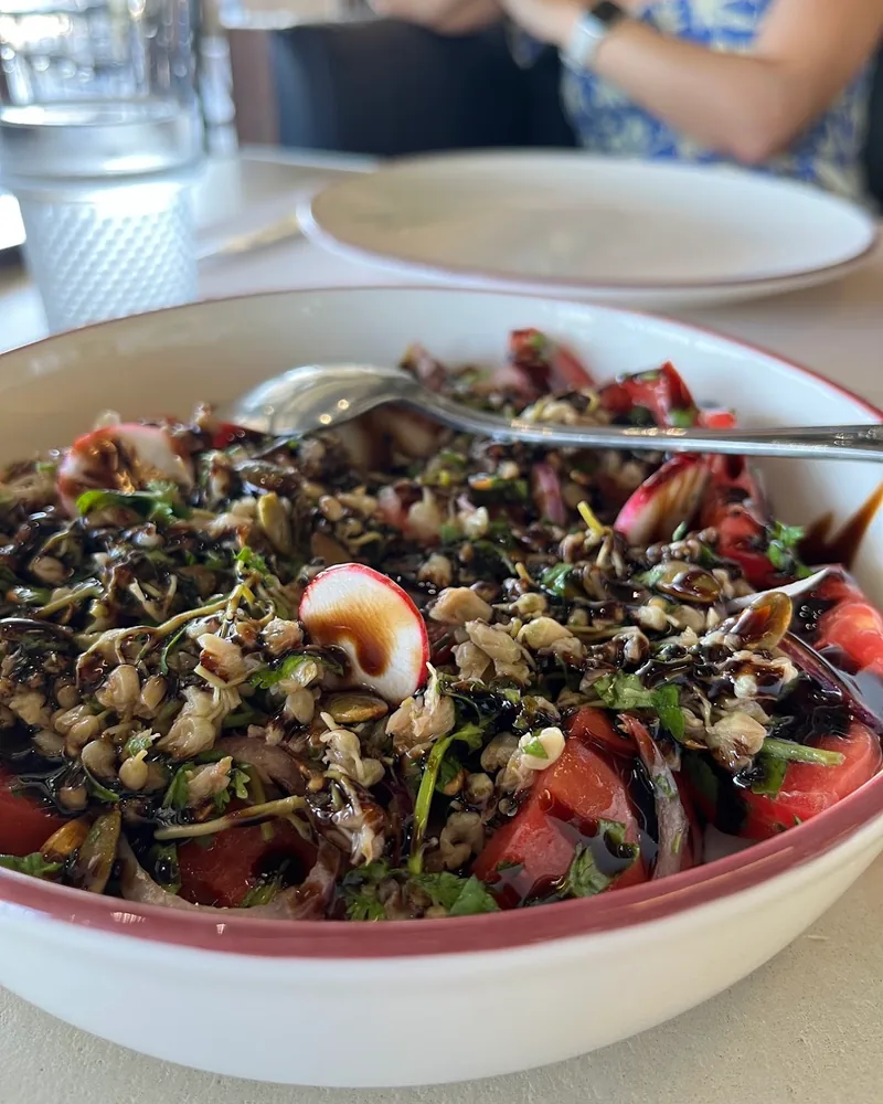 Salad with tomatoes, radishes, walnuts and balsamic glaze at Tsiskvili Terrace