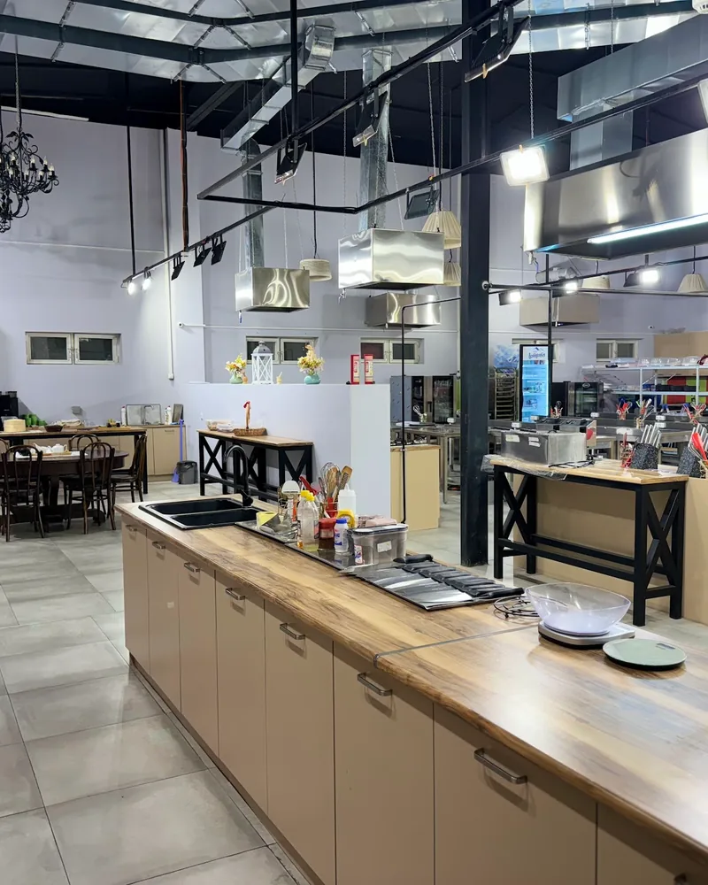 Culinary studio kitchen and dining area at Ars Gusto Culinary Academy